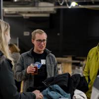 Alumni socializing together at the Fowling Fun Event